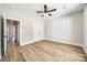 Bright bedroom with hardwood floors and ceiling fan at 636 Edwards Rd, Fort Lawn, SC 29714