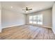 Spacious bedroom with hardwood floors and large window at 636 Edwards Rd, Fort Lawn, SC 29714