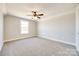 Bedroom with carpet, ceiling fan and window at 636 Edwards Rd, Fort Lawn, SC 29714