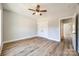 Well-lit bedroom featuring hardwood floors and double doors at 636 Edwards Rd, Fort Lawn, SC 29714