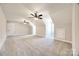 Bonus room with grey carpet and two ceiling fans at 636 Edwards Rd, Fort Lawn, SC 29714