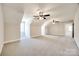 Bonus room with grey carpet and two ceiling fans at 636 Edwards Rd, Fort Lawn, SC 29714