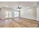 Open living space with hardwood floors and access to back patio at 636 Edwards Rd, Fort Lawn, SC 29714