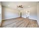 Main bedroom with hardwood floors and access to bathroom at 636 Edwards Rd, Fort Lawn, SC 29714