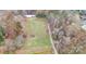 Spacious property with a large yard, detached garage, and pond at 100 Steffey Ln, Taylorsville, NC 28681