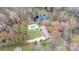 Aerial view showing home, pool, pond, and surrounding landscape at 100 Steffey Ln, Taylorsville, NC 28681