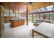 Sun-drenched solarium with a hot tub and views of the backyard at 100 Steffey Ln, Taylorsville, NC 28681
