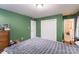 Spacious bedroom with double closets and green walls at 11028 S Ford Rd, Charlotte, NC 28214