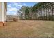 Large backyard with a wooden deck and mature trees at 1163 Hummingbird Ln, Rock Hill, SC 29732