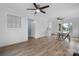 Bright dining area with white brick accent wall and hardwood floors at 1485 Nc Hwy 16 N Hwy, Taylorsville, NC 28681