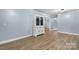 Dining area with light blue walls and hardwood floors at 1485 Nc Hwy 16 N Hwy, Taylorsville, NC 28681