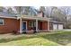 Inviting front porch with a bench and autumn decorations at 1485 Nc Hwy 16 N Hwy, Taylorsville, NC 28681