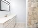 This bathroom features tile shower with modern fixtures and granite vanity at 1106 Chandler Dr, Rock Hill, SC 29732