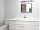 Bathroom features a vanity with quartz countertops and updated mirror at 1106 Chandler Dr, Rock Hill, SC 29732