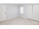 Light filled bedroom featuring a closet, window, tiled floors, and light blue walls at 1106 Chandler Dr, Rock Hill, SC 29732