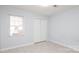 Cozy bedroom featuring light blue walls, window and closet with tiled floors at 1106 Chandler Dr, Rock Hill, SC 29732