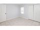 Bright bedroom with white tile flooring, fresh paint and double-door closet at 1106 Chandler Dr, Rock Hill, SC 29732