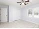 Bright bedroom with large window, ceiling fan, and closet for ample storage at 1106 Chandler Dr, Rock Hill, SC 29732