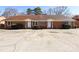 Picture of the exteriors of the units, showing a similar design for all, and parking in front of the units at 1106 Chandler Dr, Rock Hill, SC 29732