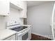 Bright kitchen features white cabinetry, quartz countertops, and stainless steel appliances at 1106 Chandler Dr, Rock Hill, SC 29732