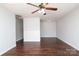 Spacious living room with ceiling fan, neutral paint, and hardwood-style flooring at 1106 Chandler Dr, Rock Hill, SC 29732