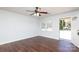 Inviting living room with hardwood flooring, ceiling fan, and a bright window at 1106 Chandler Dr, Rock Hill, SC 29732