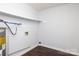 Utility room featuring white walls, dark flooring, and an energy efficient water heater at 1106 Chandler Dr, Rock Hill, SC 29732