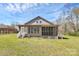 Home with back patio perfect for entertaining in landscaped yard at 12300 Caldwell Rd, Charlotte, NC 28213