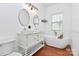 Modern bathroom featuring double vanity and soaking tub at 12300 Caldwell Rd, Charlotte, NC 28213