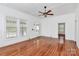 Spacious living area features hardwood floors, natural light, and a view through to other rooms at 12300 Caldwell Rd, Charlotte, NC 28213