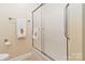 Bathroom with a shower/tub combo and frosted glass door at 1835 Fairlawn Ct, Rock Hill, SC 29732
