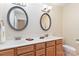Double vanity bathroom with two oval mirrors at 1835 Fairlawn Ct, Rock Hill, SC 29732