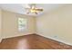 Bright bedroom with hardwood floors and ceiling fan at 1835 Fairlawn Ct, Rock Hill, SC 29732