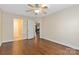 Spacious bedroom with hardwood floors and access to bathroom at 1835 Fairlawn Ct, Rock Hill, SC 29732