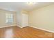 Bedroom with hardwood floors and a double door closet at 1835 Fairlawn Ct, Rock Hill, SC 29732