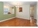 Dining area with hardwood floors and view into kitchen at 1835 Fairlawn Ct, Rock Hill, SC 29732