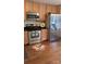 Modern kitchen with stainless steel appliances and wood cabinets at 1835 Fairlawn Ct, Rock Hill, SC 29732