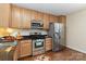 Modern kitchen with stainless steel appliances and granite countertops at 1835 Fairlawn Ct, Rock Hill, SC 29732