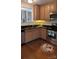 Kitchen with light wood cabinets and black countertops at 1835 Fairlawn Ct, Rock Hill, SC 29732