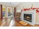 Cozy living room with fireplace and access to a private patio at 1835 Fairlawn Ct, Rock Hill, SC 29732