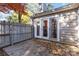 Private patio with gray fence and autumn leaves at 1835 Fairlawn Ct, Rock Hill, SC 29732