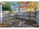 Private patio area with wooden fence and mature trees at 1835 Fairlawn Ct, Rock Hill, SC 29732