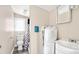 Functional bathroom with a toilet, sink, shower with curtain, and necessary plumbing at 408 E Washington Ave, Bessemer City, NC 28016
