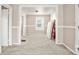 Open living area with carpet and natural light streaming through the windows at 408 E Washington Ave, Bessemer City, NC 28016
