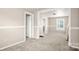 A comfortable living room area bathed in natural light with neutral decor at 408 E Washington Ave, Bessemer City, NC 28016