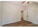Bright bedroom with hardwood floors, ceiling fan, and neutral walls create a peaceful and inviting space at 4271 Candlewood Dr, Sherrills Ford, NC 28673