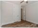 Bedroom featuring two doors and wood flooring at 4271 Candlewood Dr, Sherrills Ford, NC 28673