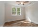 Bright bedroom with two windows and wood flooring at 4271 Candlewood Dr, Sherrills Ford, NC 28673
