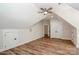 Spacious bonus room with dormer storage and ceiling fan at 4271 Candlewood Dr, Sherrills Ford, NC 28673