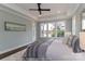 Light-filled main bedroom with windows, hardwood floors, and neutral color palette at 4271 Candlewood Dr, Sherrills Ford, NC 28673